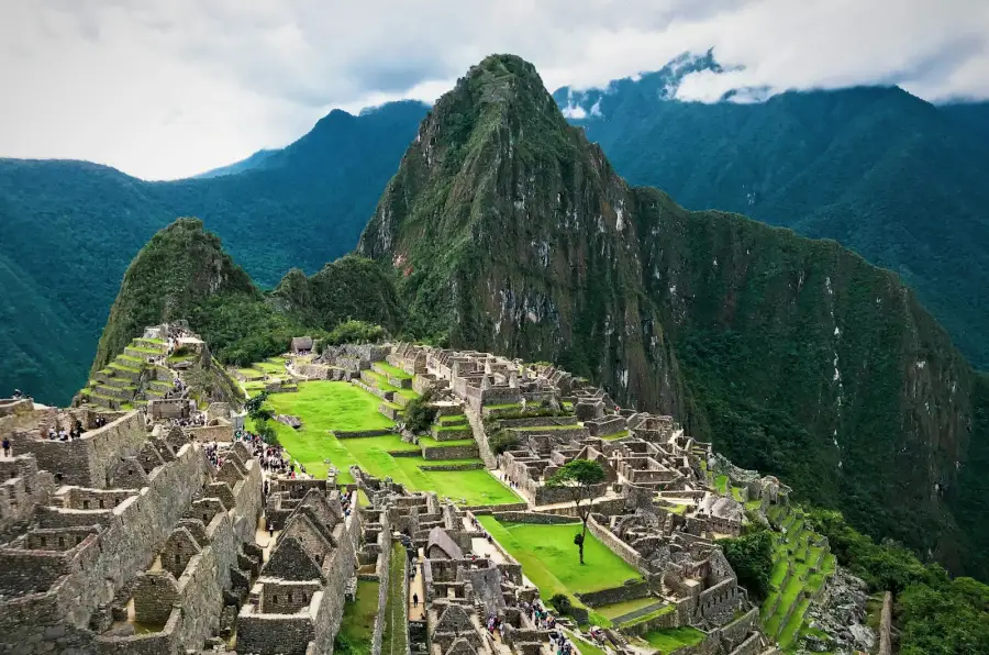 The stone ruins of Machu Picchu among green mountains, Peru